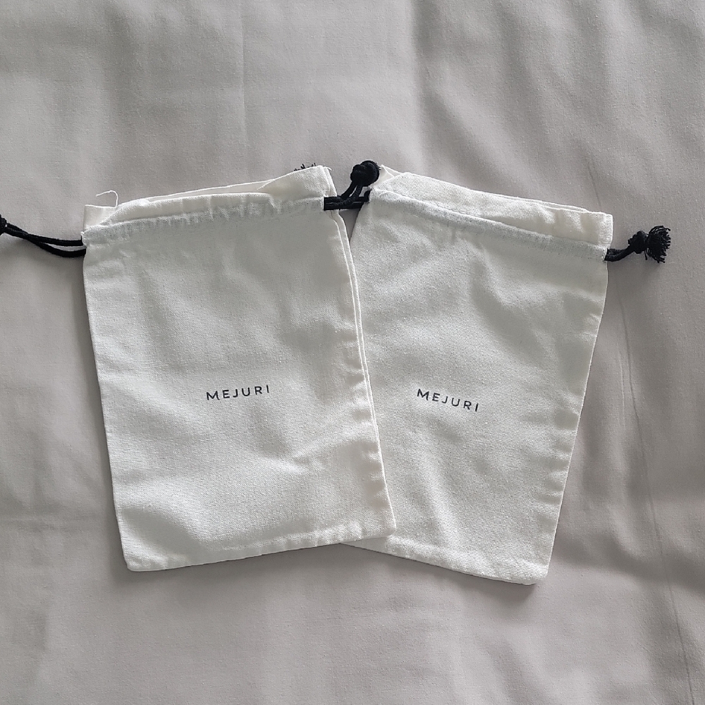 Mejuri Cream Jewelry Pouches